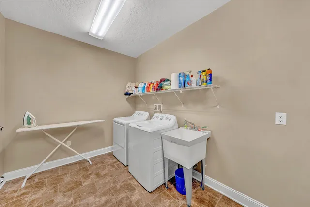 a living room with couch and wooden floor