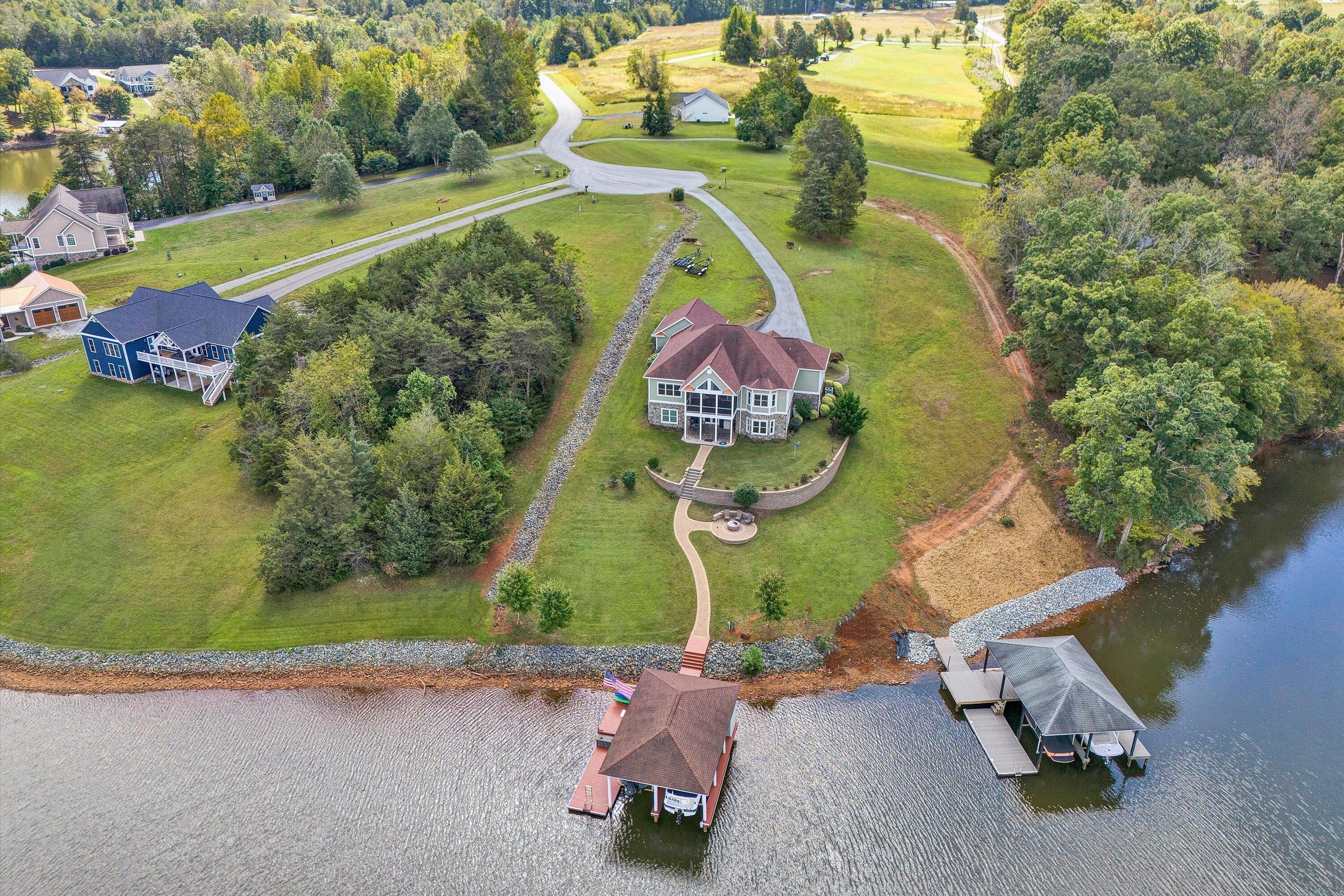 440 Augusta Way Wirtz, VA 24184 - Photo 3 of 63 an aerial view of a house with a yard basket ball court and outdoor seating