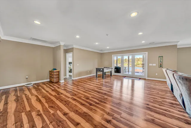 a view of a patio with a table chairs and a porch