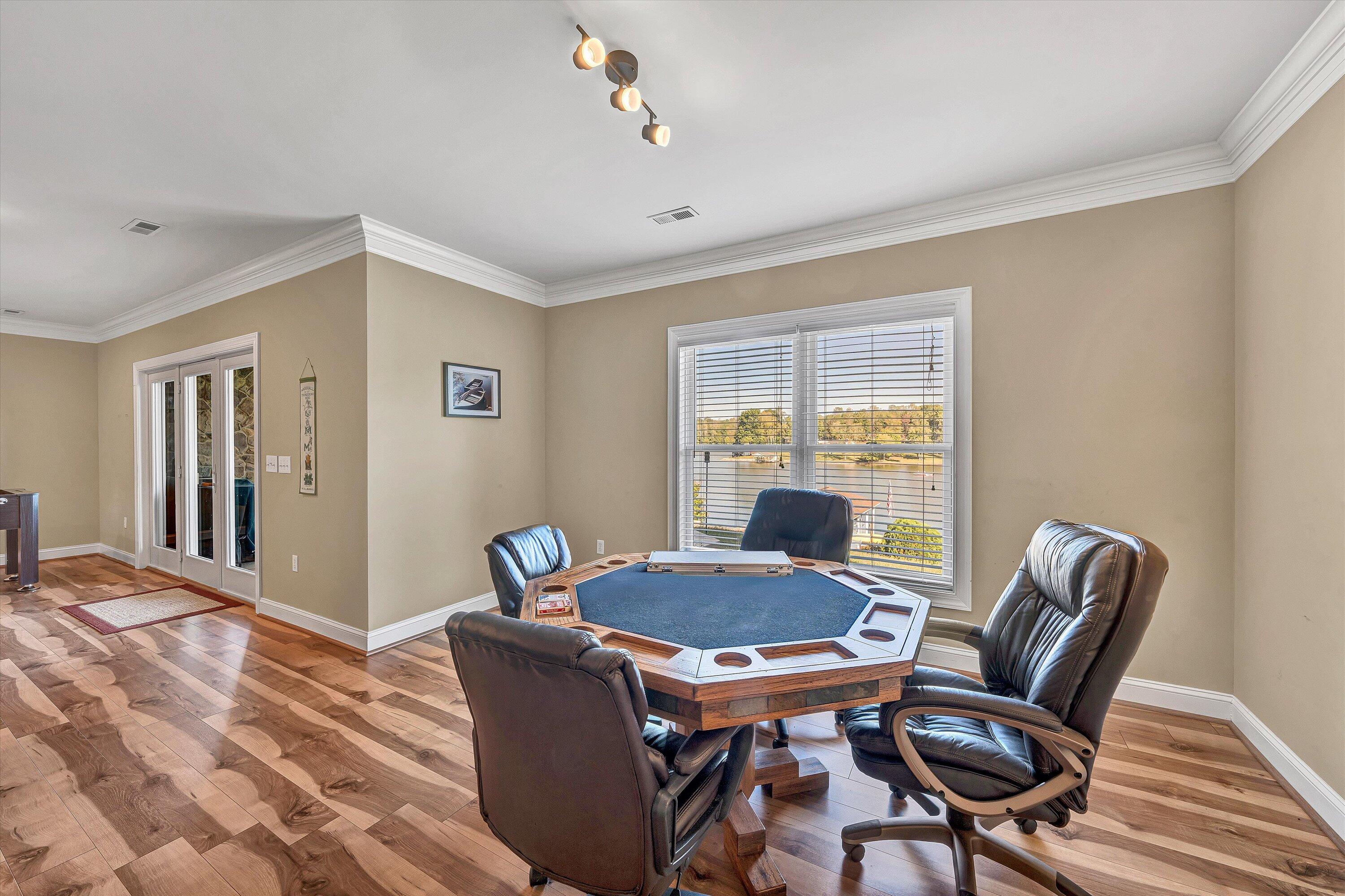 440 Augusta Way Wirtz, VA 24184 - Photo 34 of 63 a view of a dining room with furniture window and wooden floor
