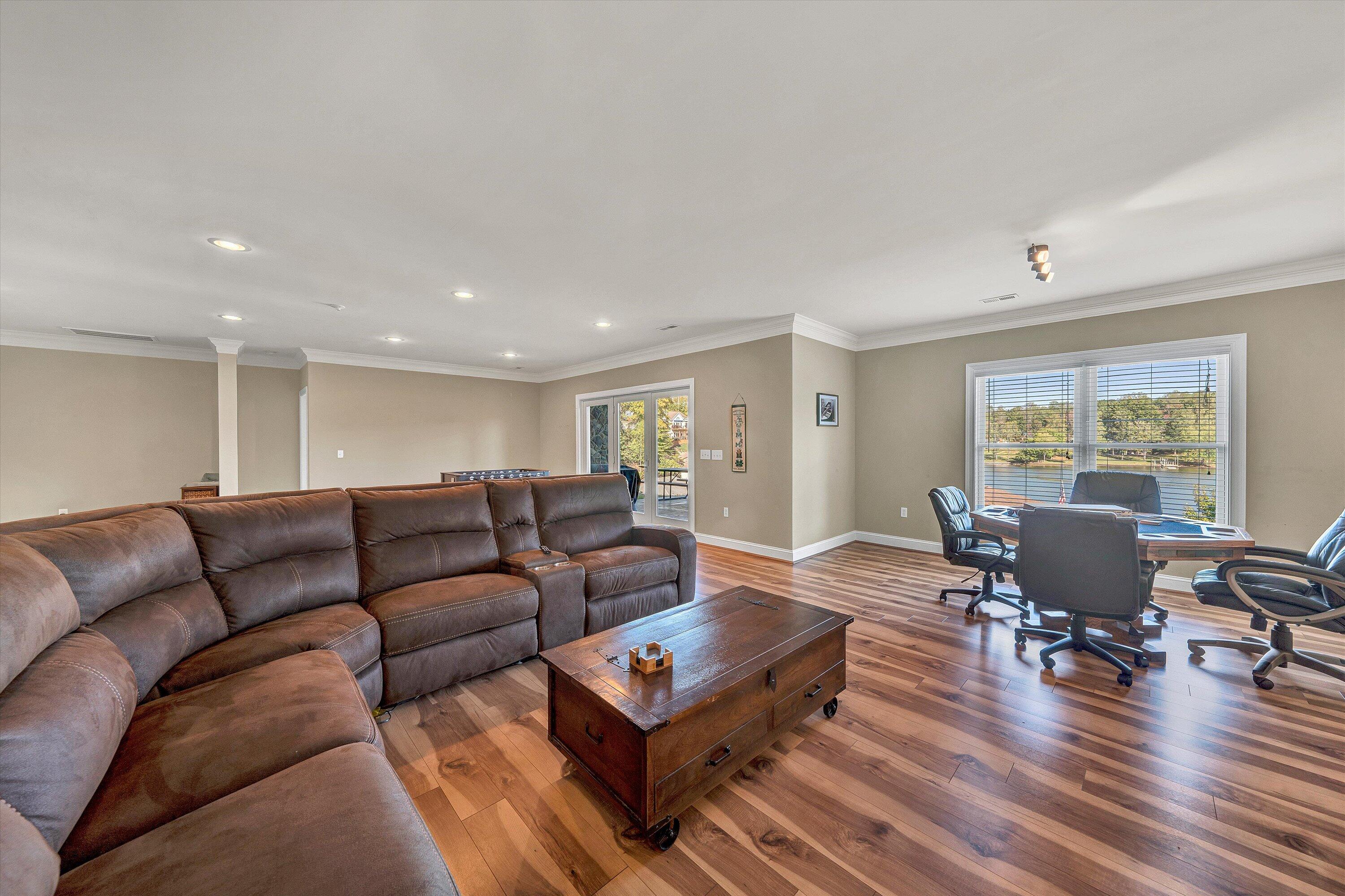 440 Augusta Way Wirtz, VA 24184 - Photo 35 of 63 a living room with furniture flat screen tv and wooden floor