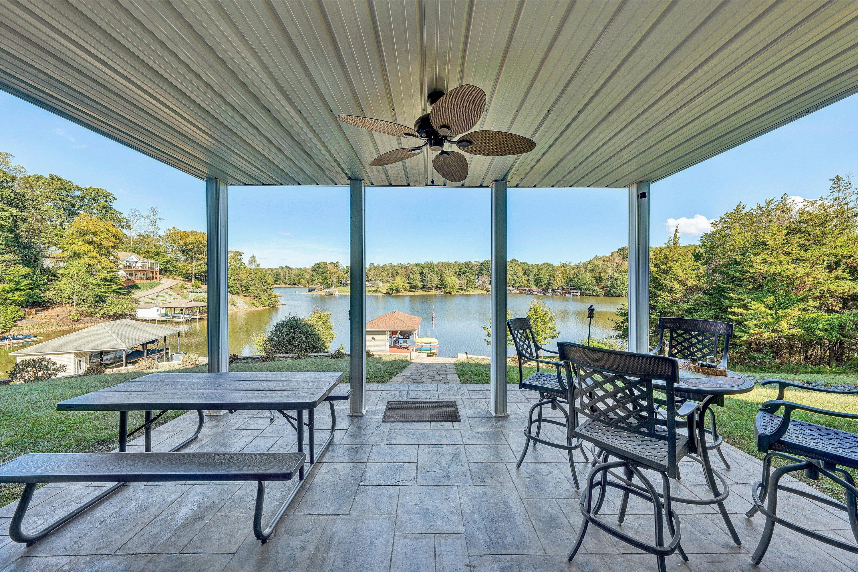 440 Augusta Way Wirtz, VA 24184 - Photo 36 of 63 a view of a patio with a table chairs and a porch