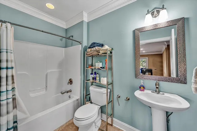 a front view of a house with outdoor seating