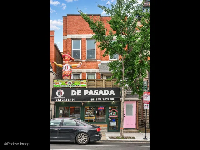 a car parked in front of a building