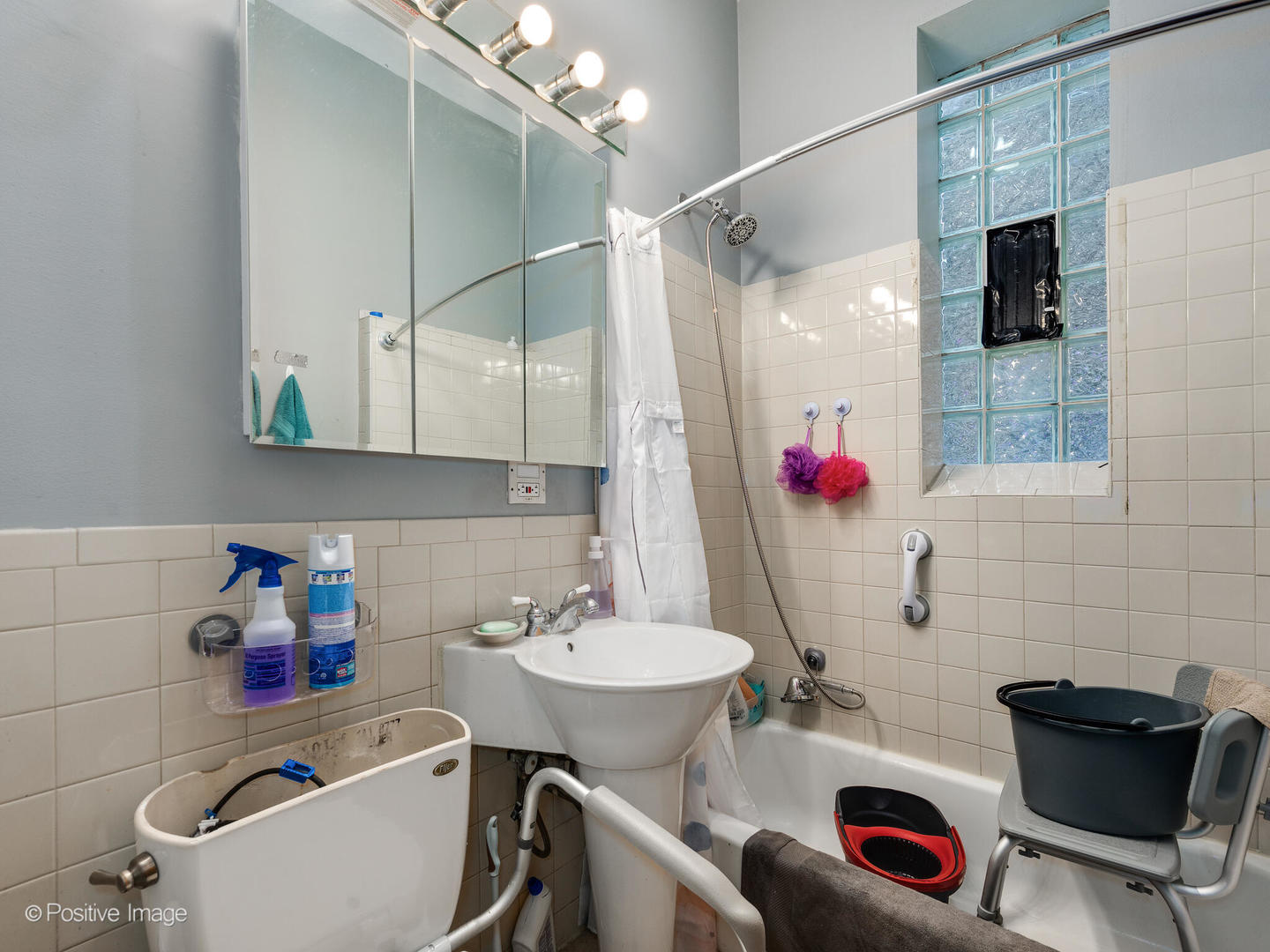 1517 West Taylor Street Chicago, IL 60607 - Photo 13 of 27 a bathroom with a sink toilet and shower