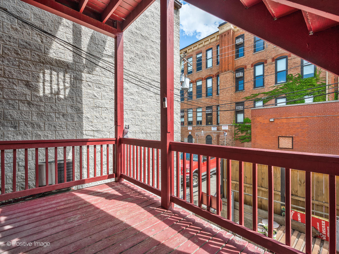 1517 West Taylor Street Chicago, IL 60607 - Photo 14 of 27 a view of a brick building from a balcony