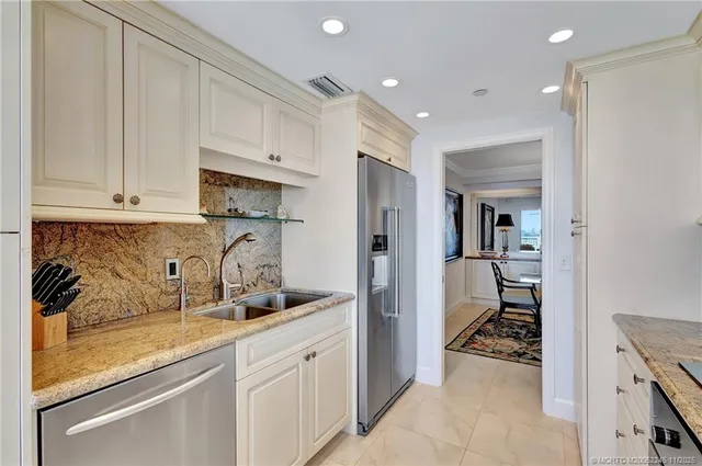 a bathroom with a shower and a sink