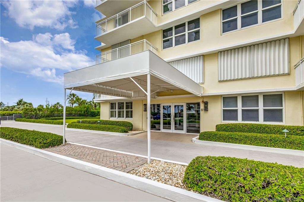 500 Ocean Drive, Unit W11 North Palm Beach, FL 33408 - Photo 52 of 77 a view of a house next to a yard