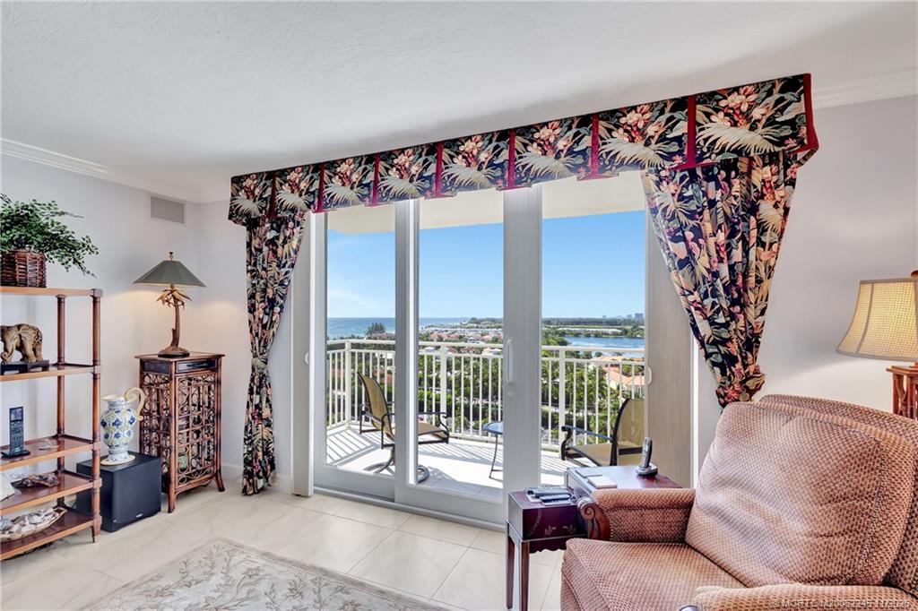 500 Ocean Drive, Unit W11 North Palm Beach, FL 33408 - Photo 8 of 77 a living room with furniture and a large window