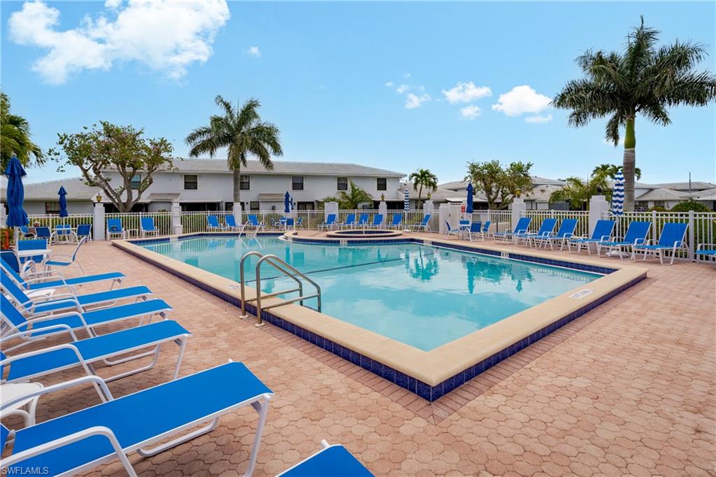 116 Clyburn Street, Unit C6 Marco Island, FL 34145 - Photo 25 of 32 swimming pool with outdoor seating
