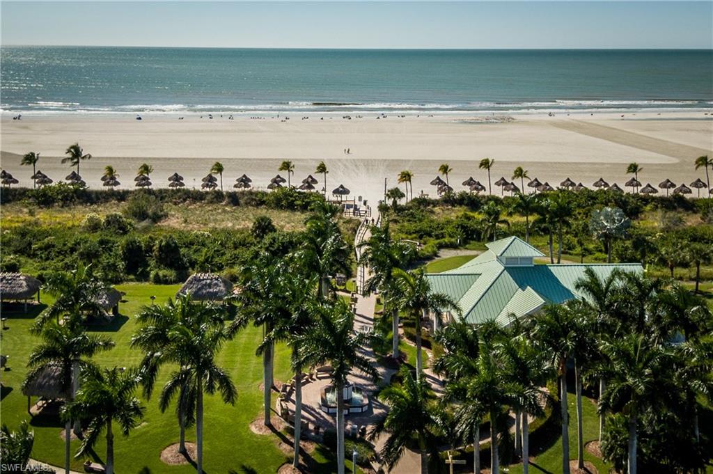 116 Clyburn Street, Unit C6 Marco Island, FL 34145 - Photo 32 of 32 a view of an ocean and beach