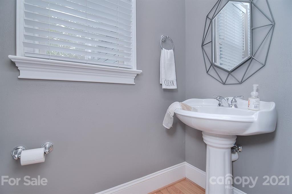 834 Promenade Walk Fort Mill, SC 29708 - Photo 22 of 45 a bathroom with a sink and a mirror