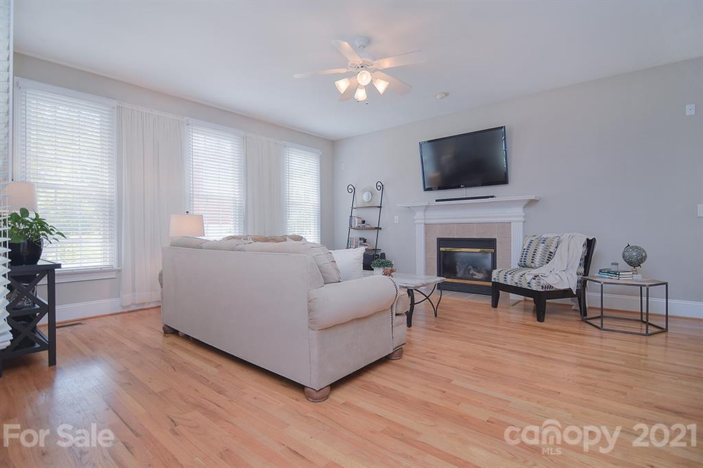 834 Promenade Walk Fort Mill, SC 29708 - Photo 8 of 45 a living room with furniture fireplace and flat screen tv