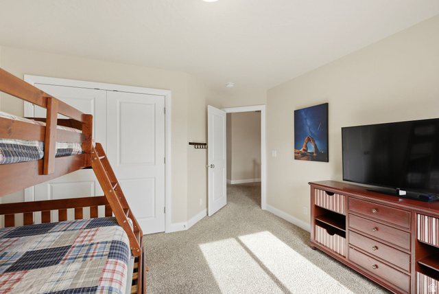 4269 Razor Drive Washington, UT 84780 - Photo 20 of 50 Bedroom featuring baseboards and light carpet