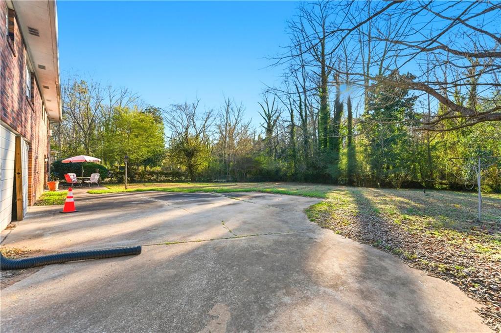 3033 Thrasher Circle Decatur, GA 30032 - Photo 24 of 25 a view of a street with houses on both side