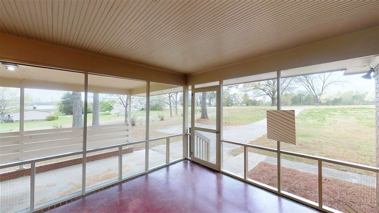 108 Rand Road Raleigh, NC 27603 - Photo 23 of 29 Carport to the left of the porch is so convenient. Screened porch and Carport