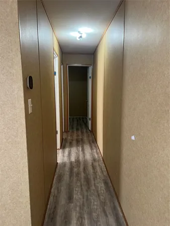 a view of hallway with an entryway
