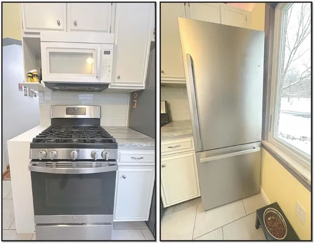 a bathroom with a granite countertop sink mirror vanity and toilet
