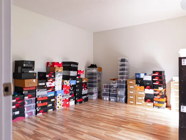 a view of a garage with toys and a wooden floor