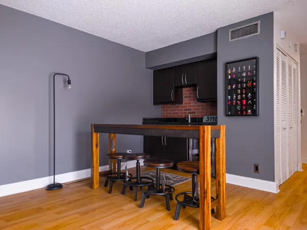 a view of a workspace with furniture