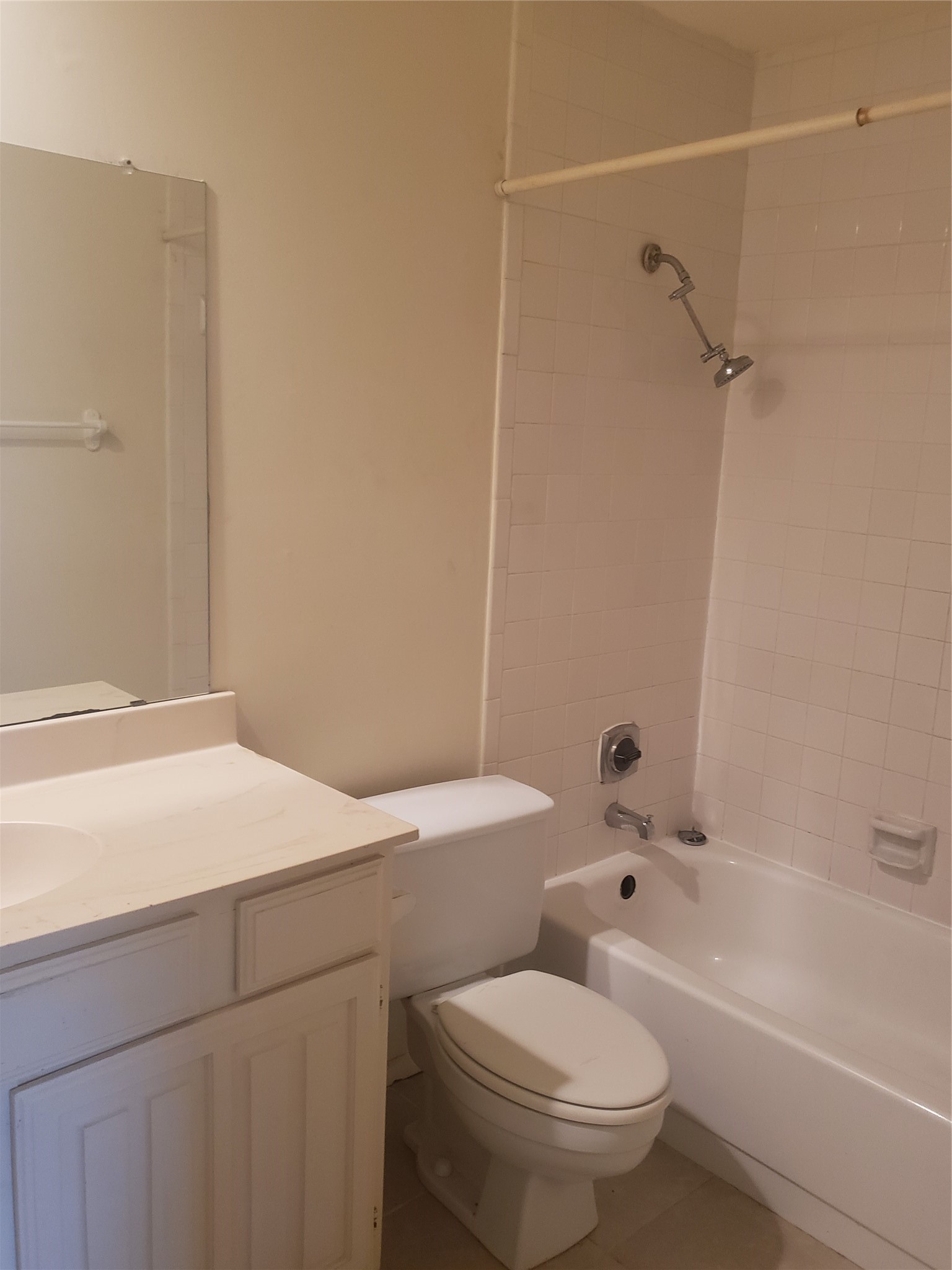 16120 Stuebner Airline Road, Unit 603 Spring, TX 77379 - Photo 16 of 19 a bathroom with a toilet and a bathtub