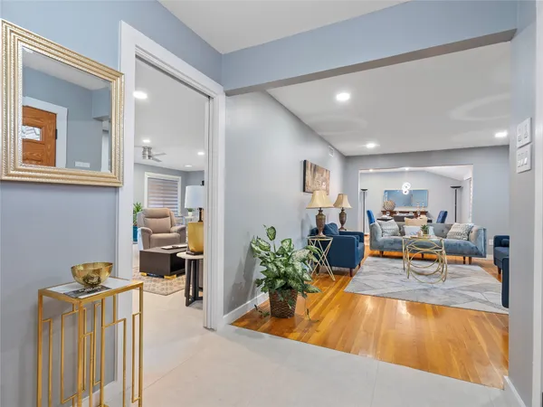 a living room with furniture and a table