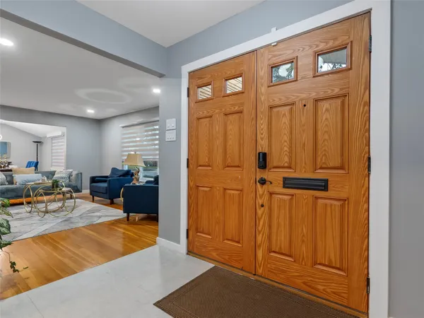 a view of a livingroom with furniture and storage area