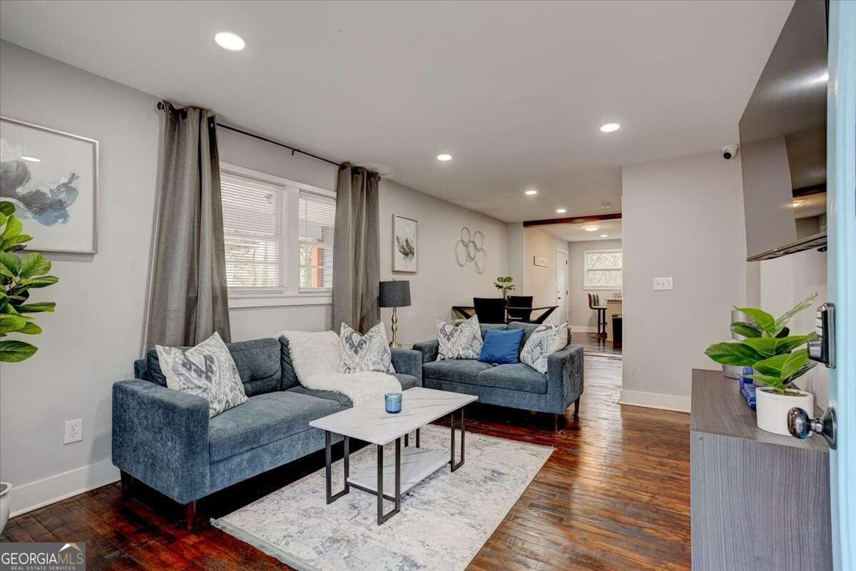 130 Mount Zion Road Southwest Atlanta, GA 30354 - Photo 2 of 7 a living room with furniture potted plant and a window