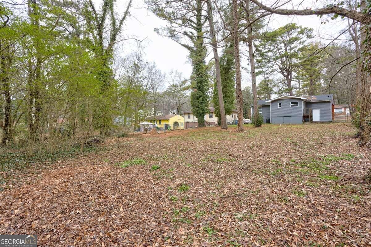 130 Mount Zion Road Southwest Atlanta, GA 30354 - Photo 7 of 7 a view of a yard with trees