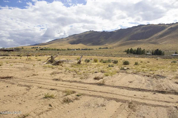 a view of ocean and mountain