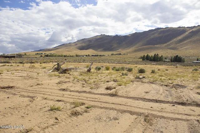 a view of ocean and mountain