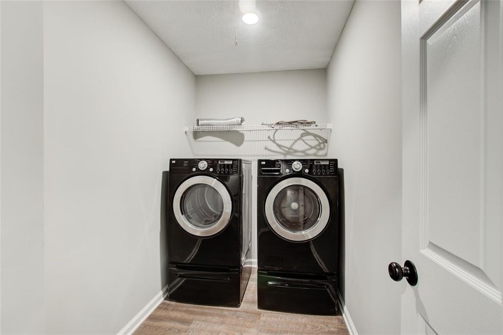 4110 Ridgebrook Bend Cumming, GA 30028 - Photo 25 of 49 a view of washer and dryer in a utility room