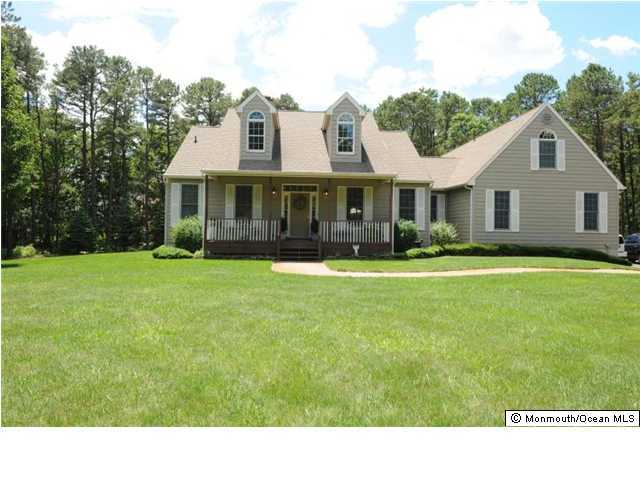 619 Reed Road Jackson, NJ 08527 - Photo 1 of 3 a bathroom with a garden and trees