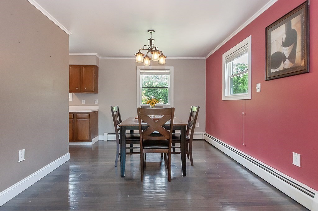 68 Bullock Road Freetown, MA 02717 - Photo 11 of 32 a view of a dining room with furniture window and outside view