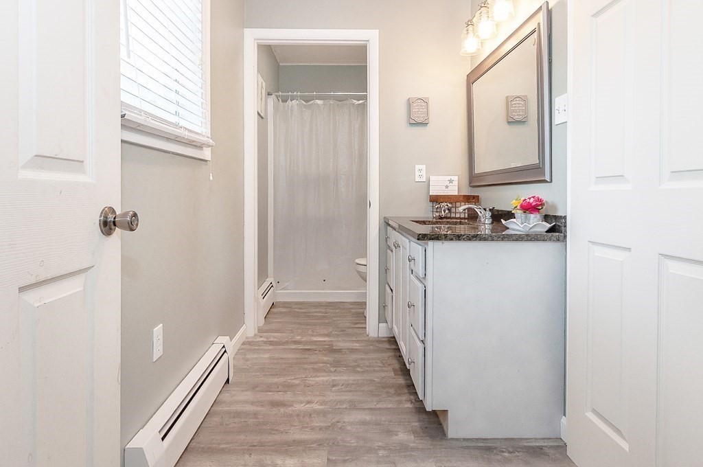 68 Bullock Road Freetown, MA 02717 - Photo 16 of 32 a hall way with storage and utility