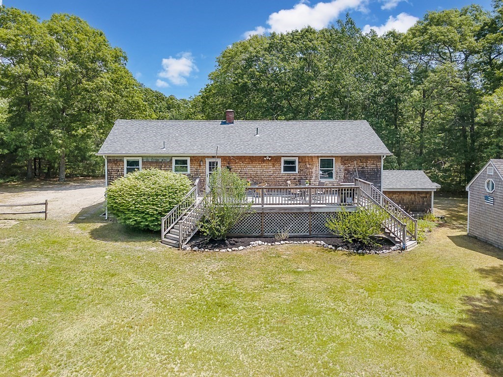 68 Bullock Road Freetown, MA 02717 - Photo 27 of 32 a view of a house with pool and sitting area