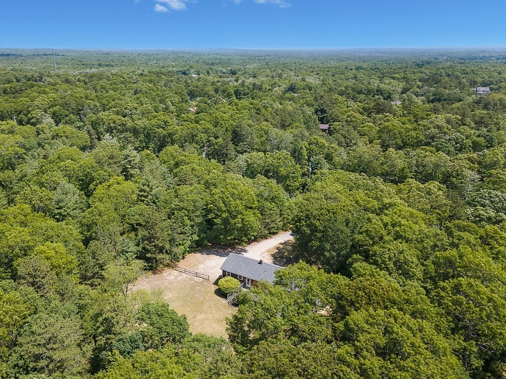 68 Bullock Road Freetown, MA 02717 - Photo 29 of 32 a view of a city with lush green forest