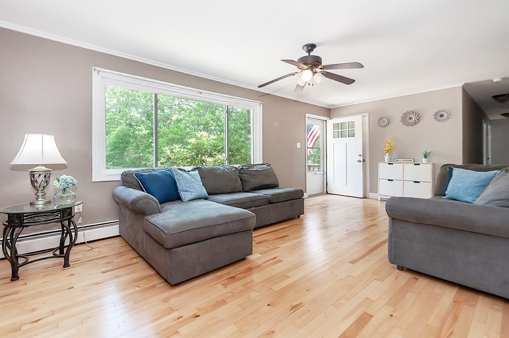 68 Bullock Road Freetown, MA 02717 - Photo 9 of 32 a living room with furniture and a large window
