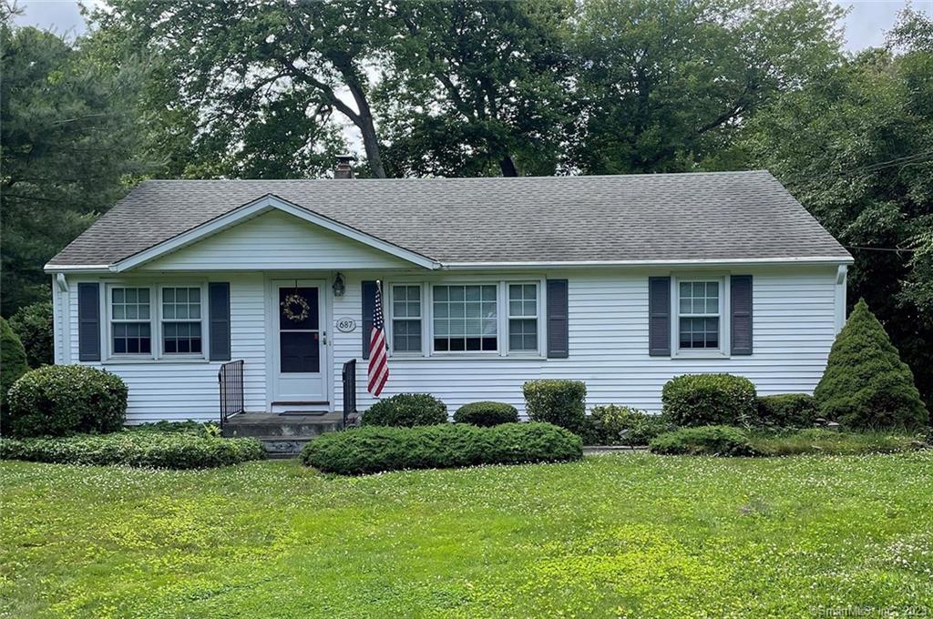 687 Burroughs Road Fairfield, CT 06825 - Photo 1 of 1 a view of a house with a yard and plants