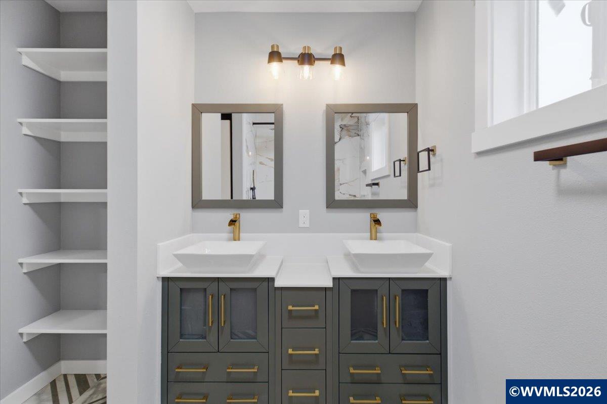 28411 Liberty Road Sweet Home, OR 97386 - Photo 43 of 50 a bathroom with a sink and a mirror
