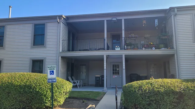 a view of a house with a window and balcony