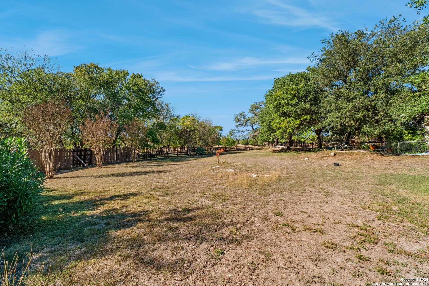 24 Pfeiffer Road Boerne, TX 78006 - Photo 20 of 22 a view of dirt field with trees in background