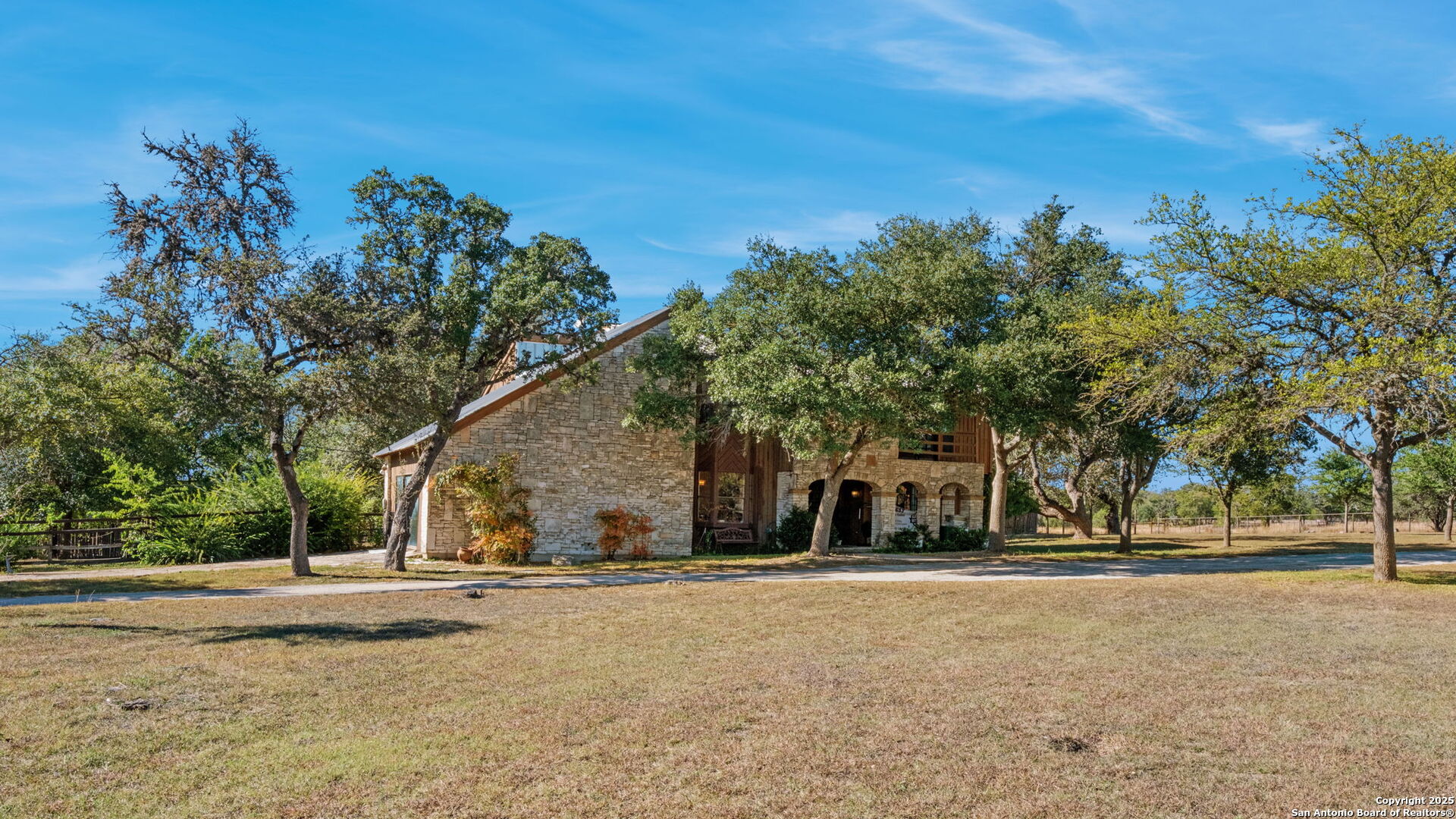 24 Pfeiffer Road Boerne, TX 78006 - Photo 2 of 22 a view of large tree in front of a house
