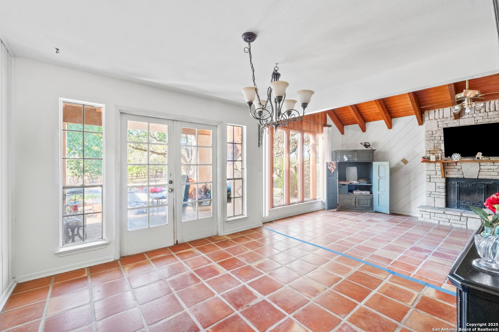 24 Pfeiffer Road Boerne, TX 78006 - Photo 8 of 22 a view of a room with window and chandelier