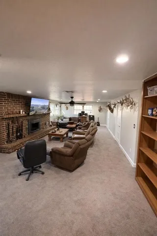 a room with furniture and a flat screen tv