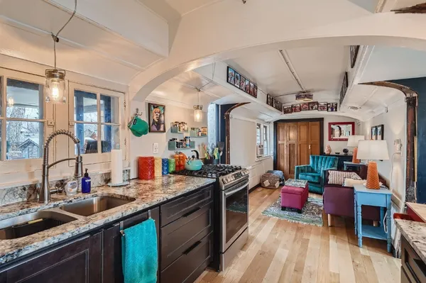 a kitchen with granite countertop lots of counter top space