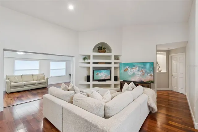 a view of a dining room with furniture and window