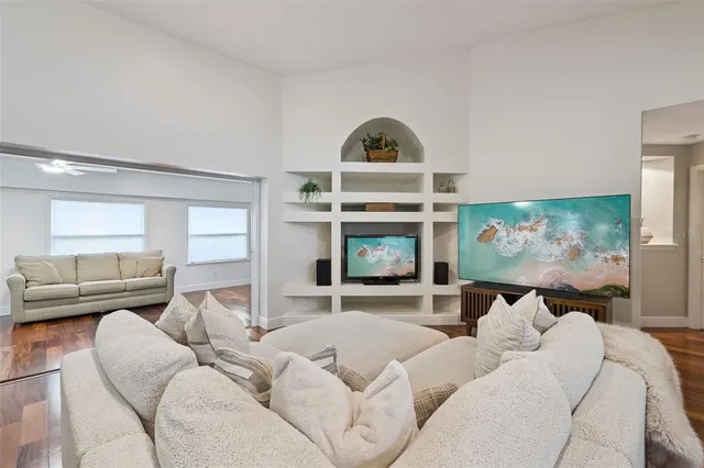 a kitchen with stainless steel appliances a sink stove and cabinets