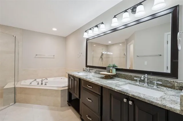 a bedroom with a bed and a book shelf
