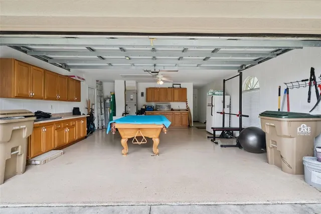 a view of a swimming pool with a backyard